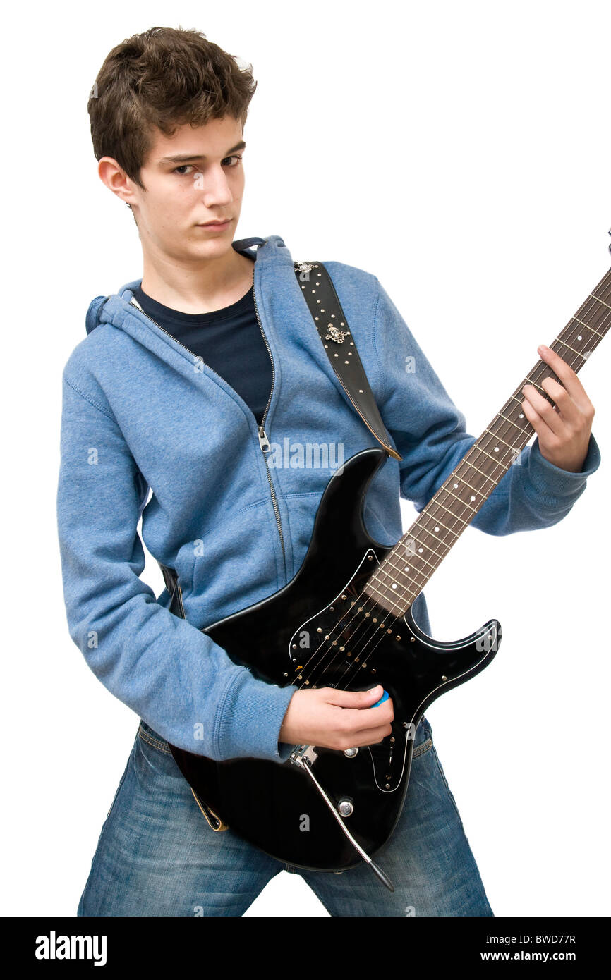 Teenager playing electric guitar on white background Stock Photo