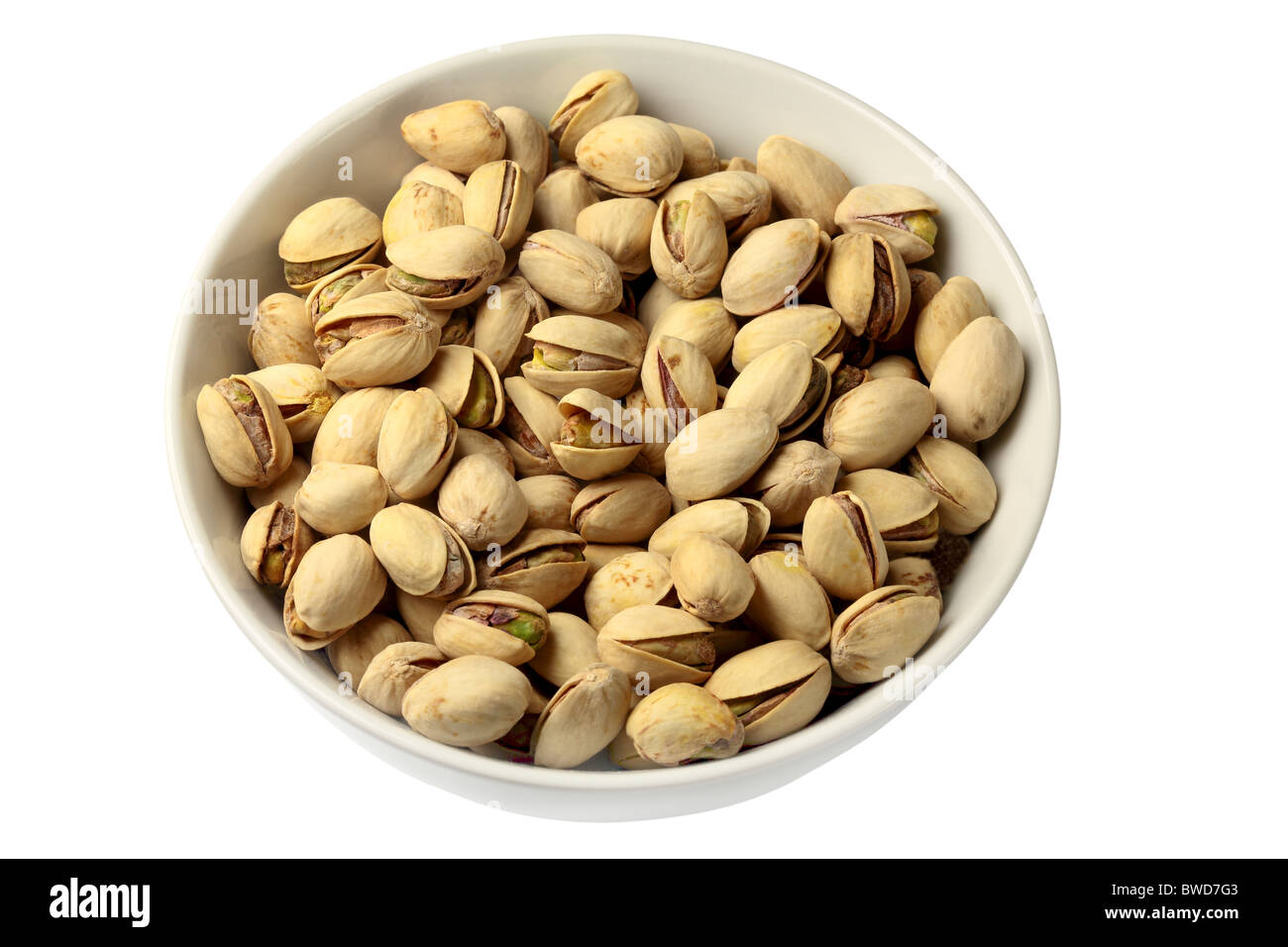 Pistachio Nuts in bowl Stock Photo