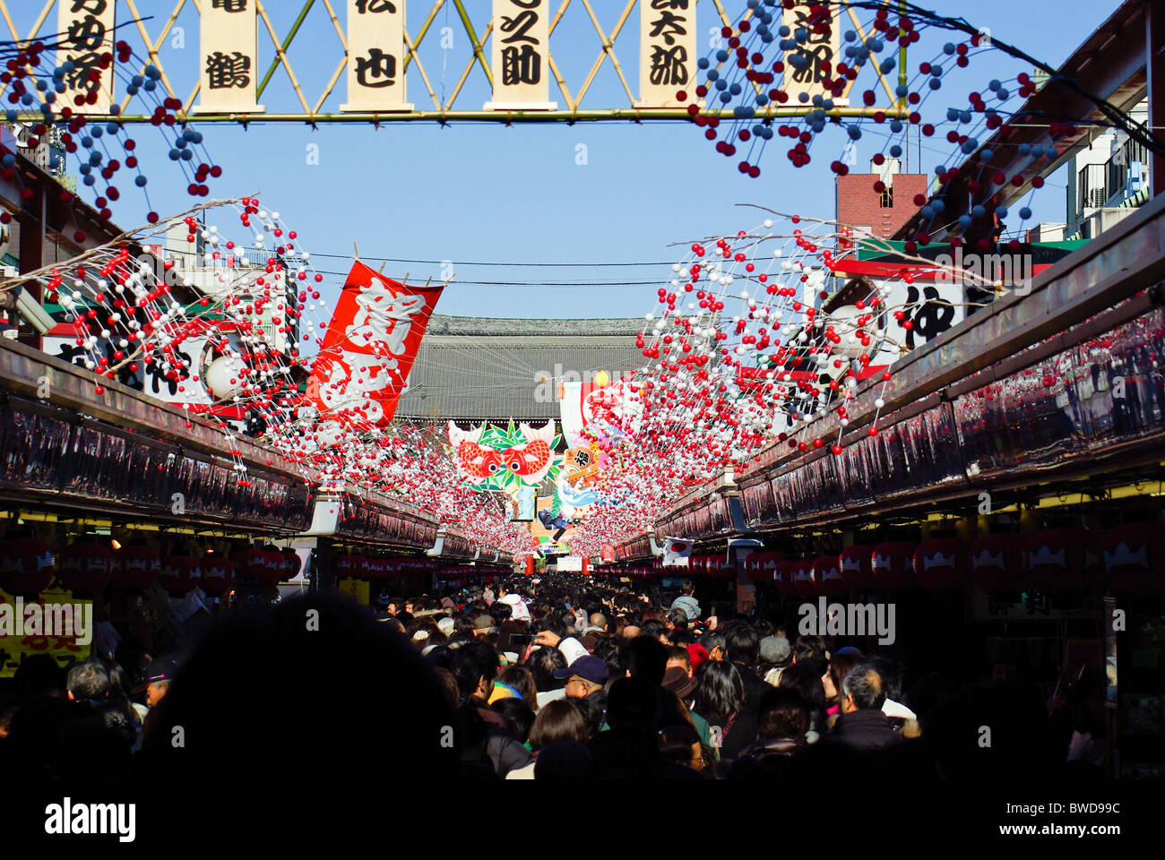 Nakamise Outdoor Market in Asakusa leadig to Sensoji Temple packed with people during New Years Celebrations Stock Photo