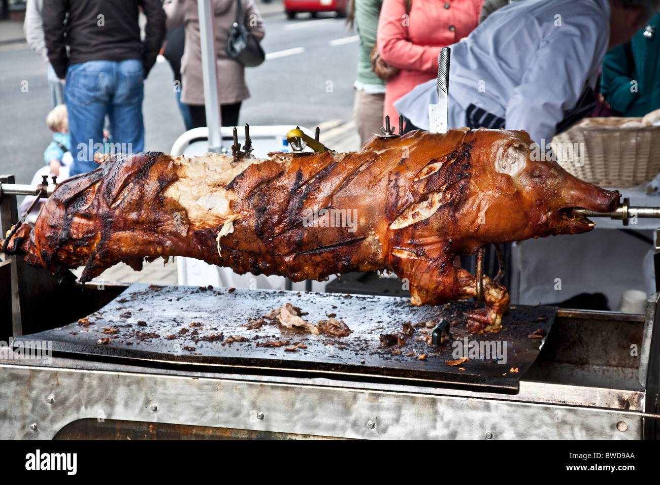 A hog roast in the street as part of the Wintertainment festival in Troon, East Ayrshire, Scotland Stock Photo