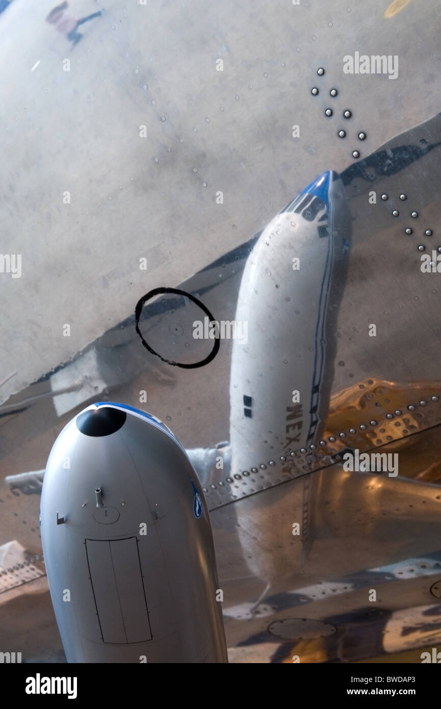 Model airplane reflection in actual aircraft Stock Photo
