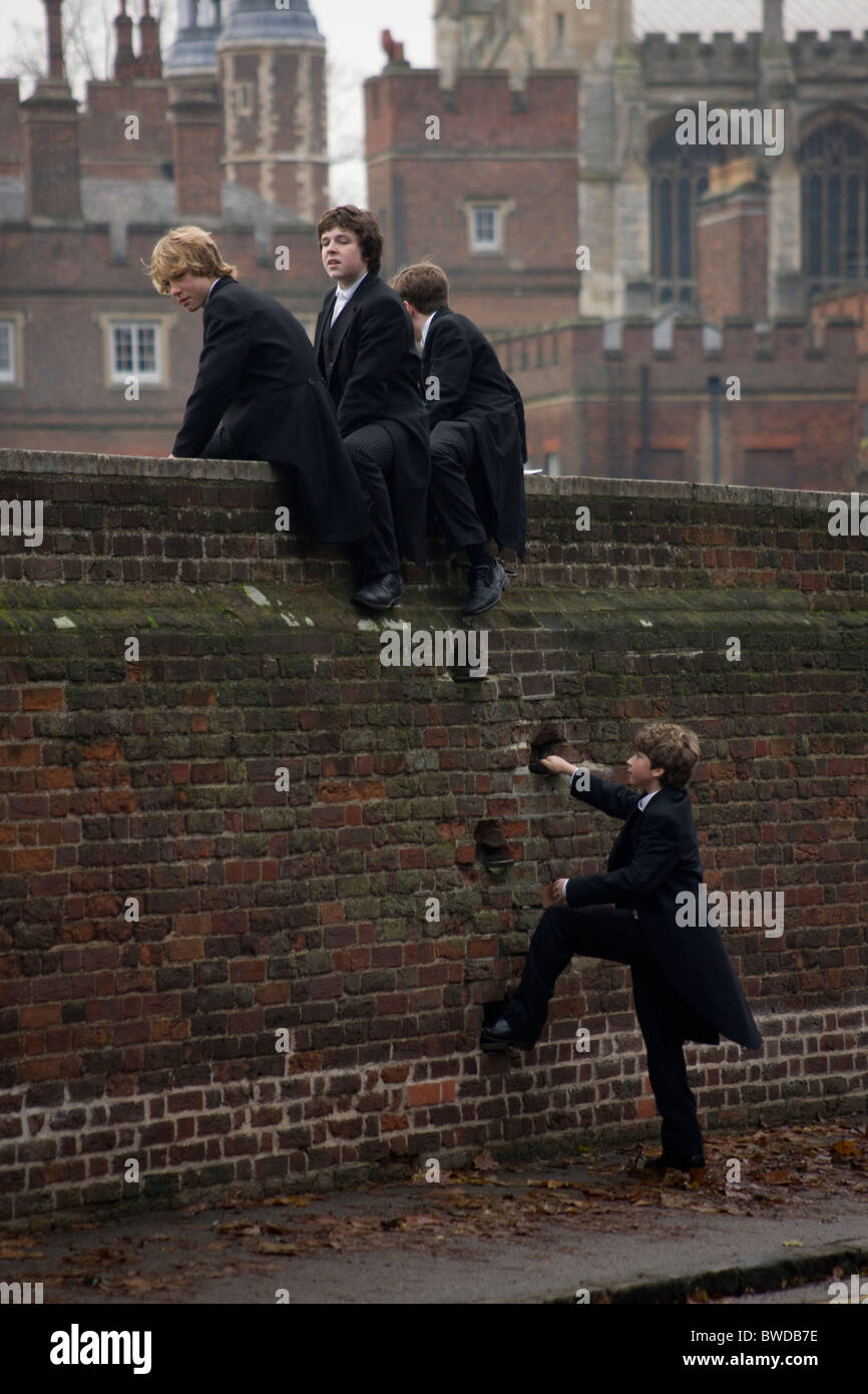 Eton College 2010. Boys climbing the wall in readiness to watch the famous Eton College wall game. Stock Photo