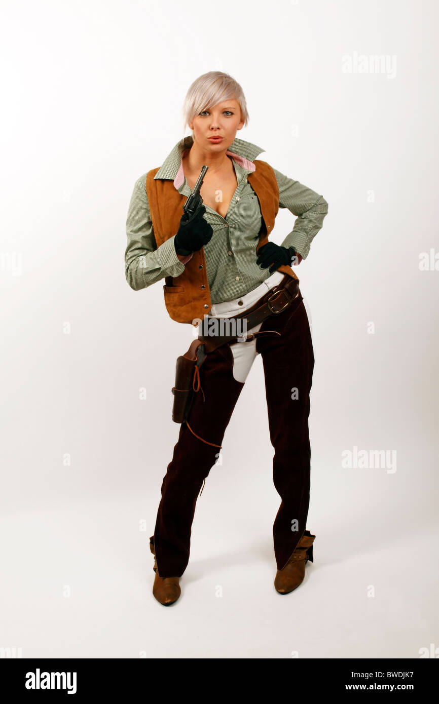 cowgirl with toy gun chaps and leather holster Stock Photo