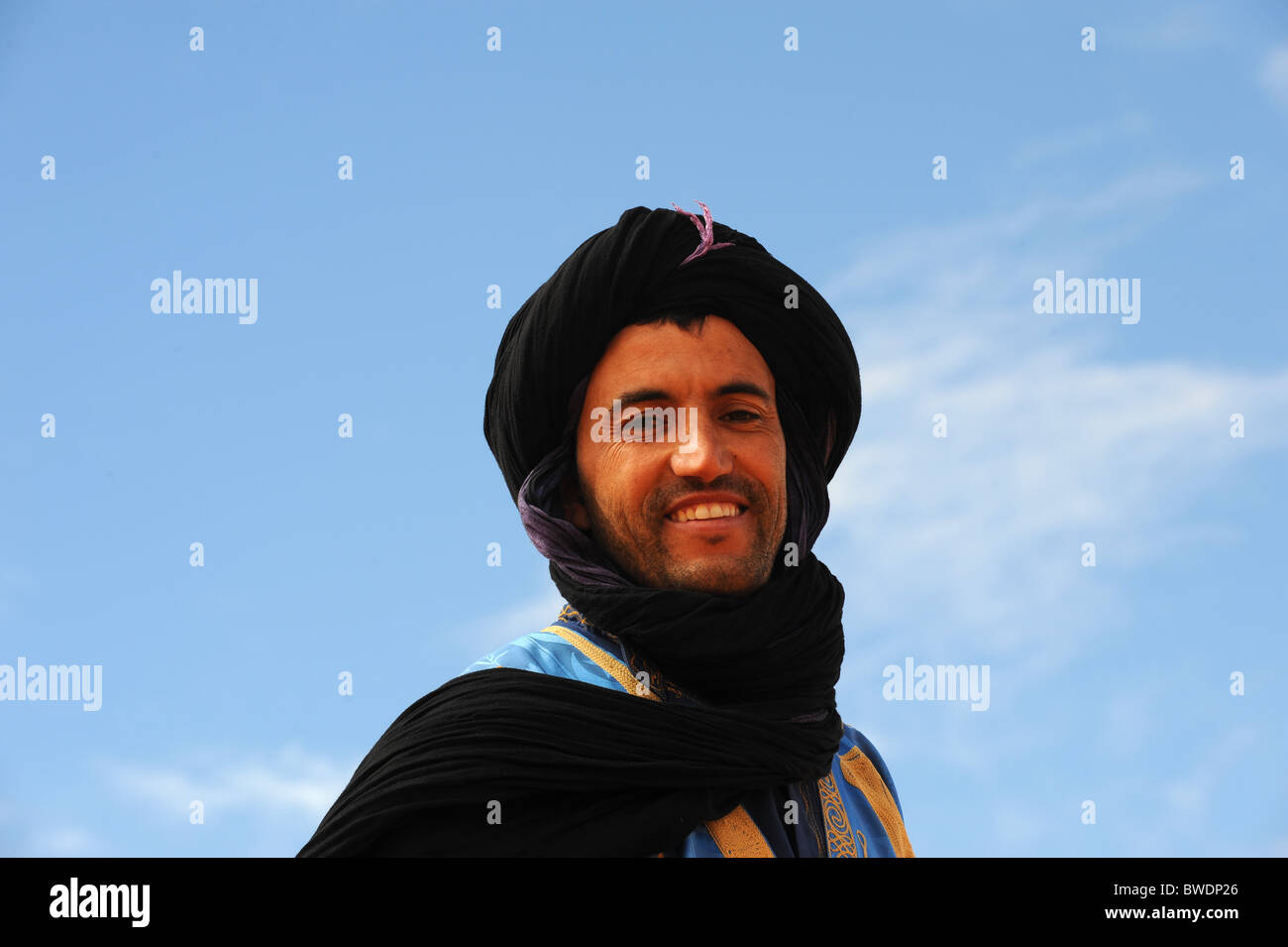 Berber tribesman in the Sahara desert in Southern Morocco Stock Photo