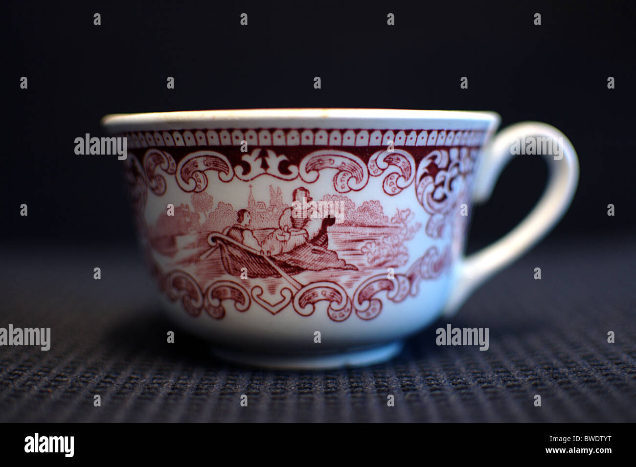 A porcelain's cup of coffee with a  rowing boat painted, it's madein  Maastricht in Holland, that's from the collection Castillo Stock Photo