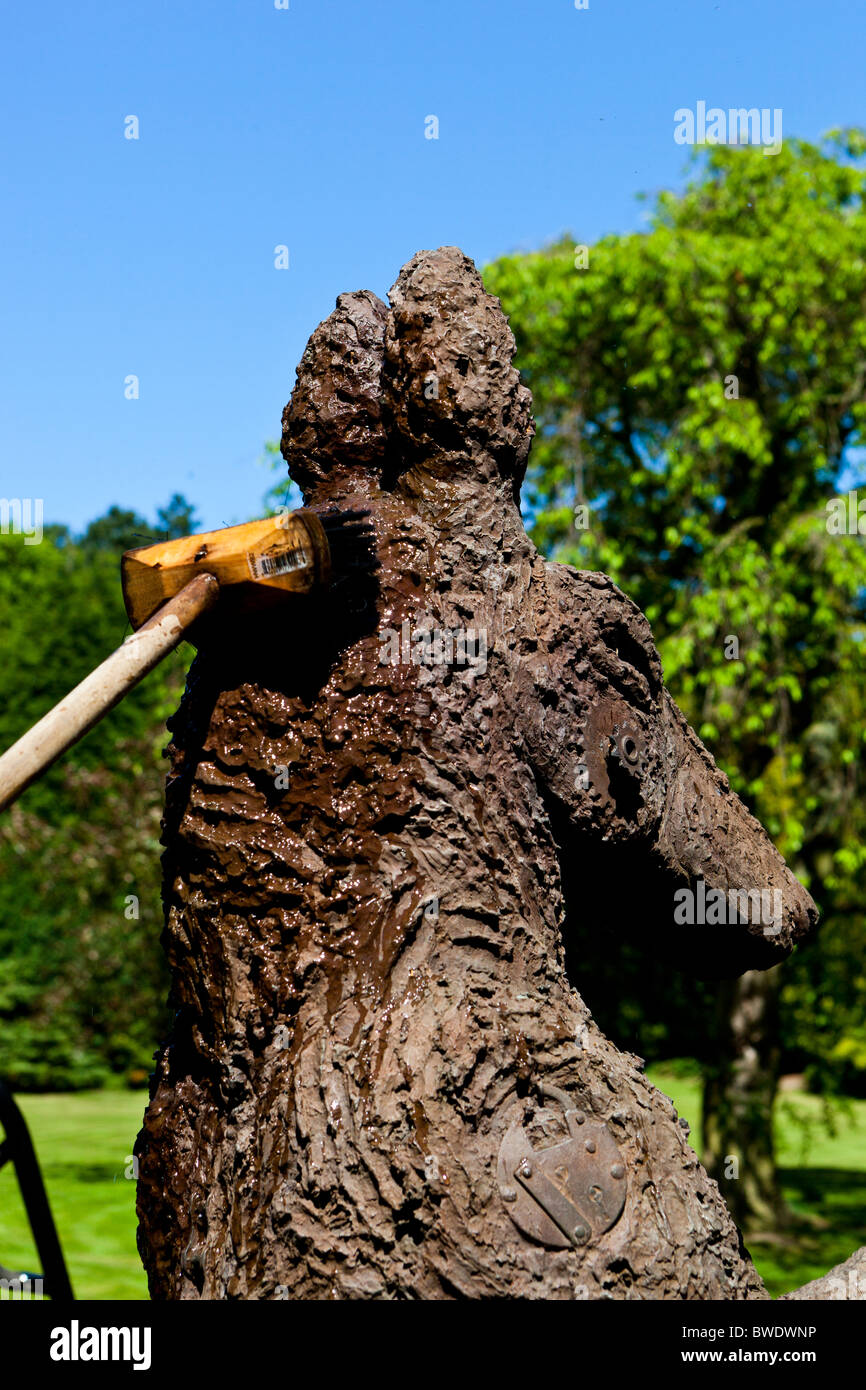 Cleaning outdoor sculpture Stock Photo
