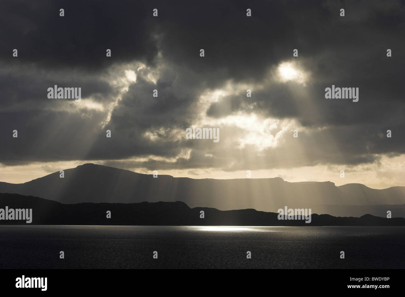 Light rays & stormy light over Raasay & Isle of Skye from Applecross across Inner Sound Skye & Lochalsh Highland Stock Photo