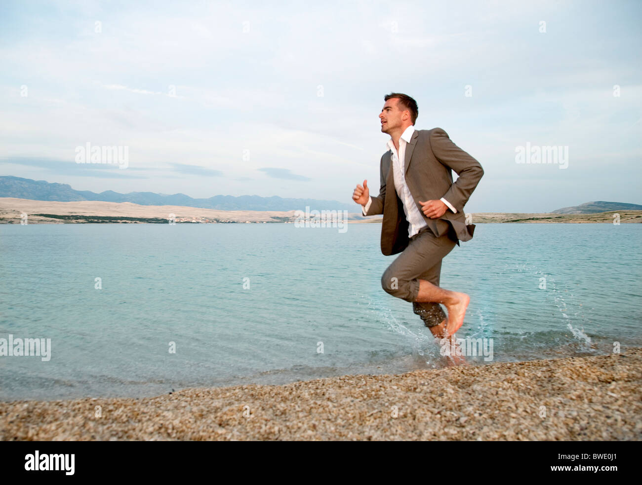Man running side view barefoot hi-res stock photography and images - Alamy