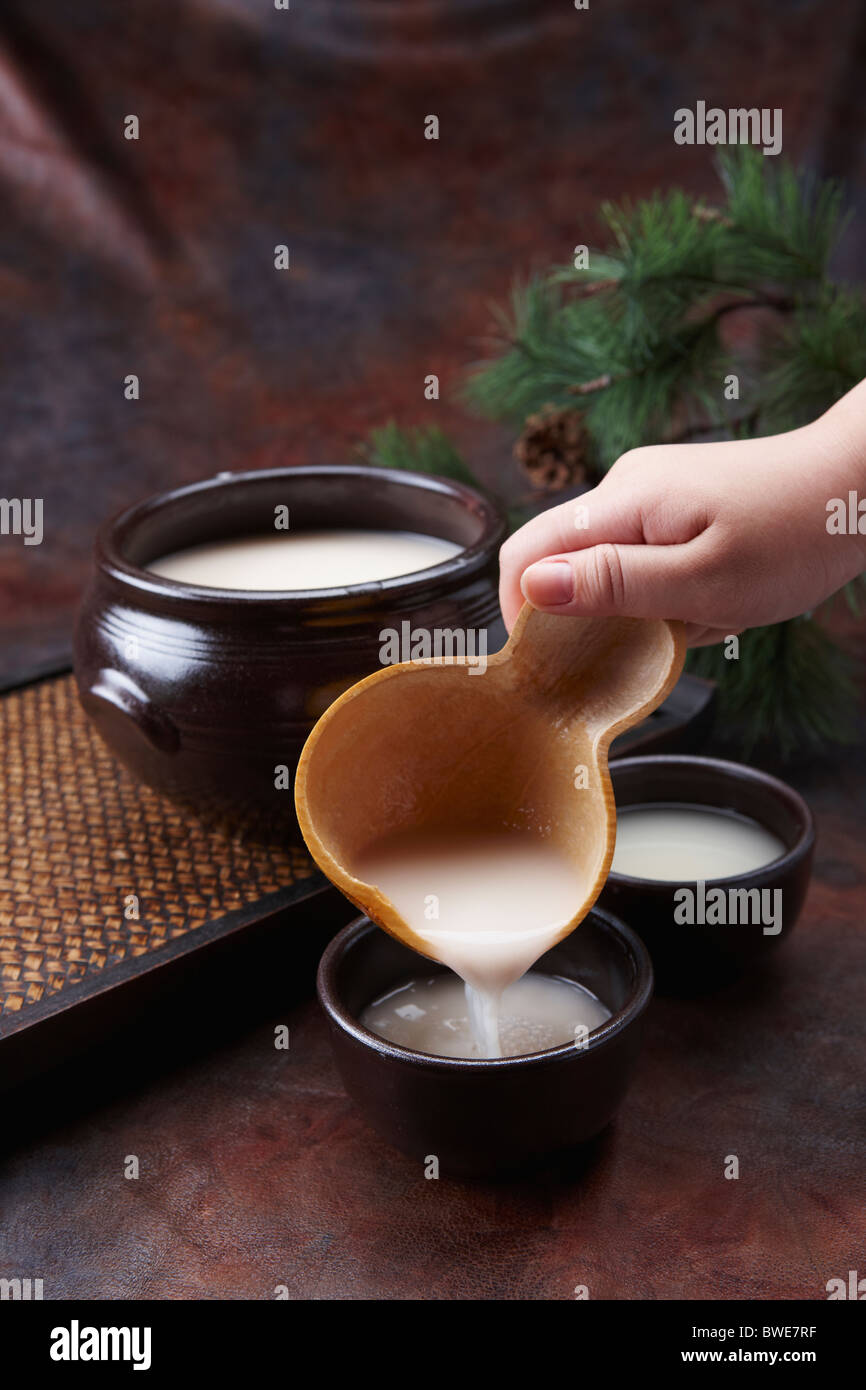 pouring Korean traditional alcohol made from grain Stock Photo Alamy