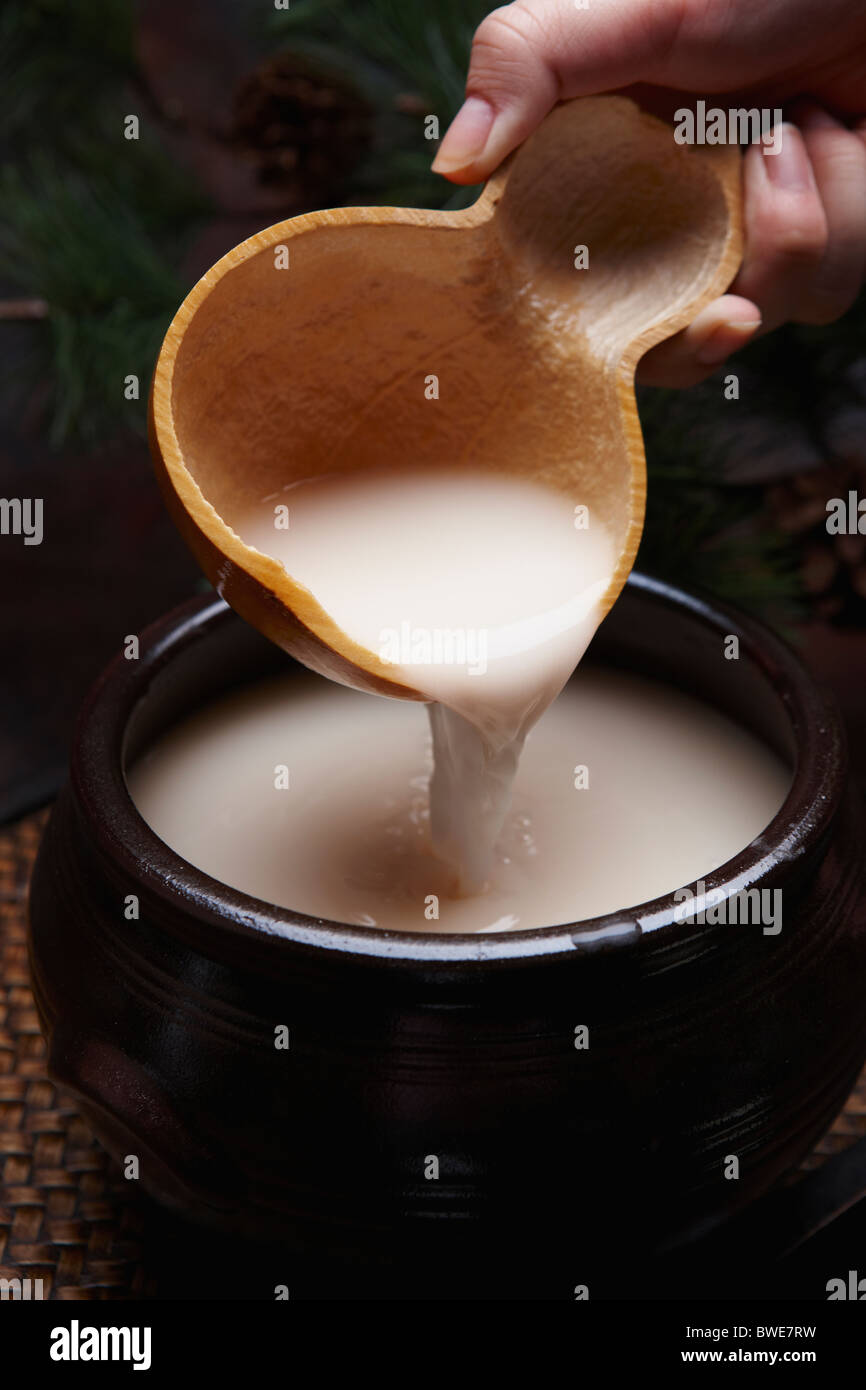 pouring Korean traditional alcohol made from grain Stock Photo Alamy