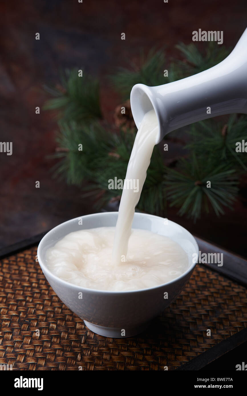 pouring Korean traditional alcohol made from grain Stock Photo Alamy
