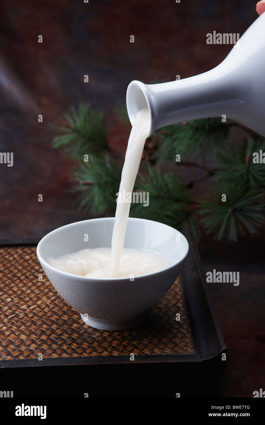 pouring Korean traditional alcohol made from grain Stock Photo Alamy