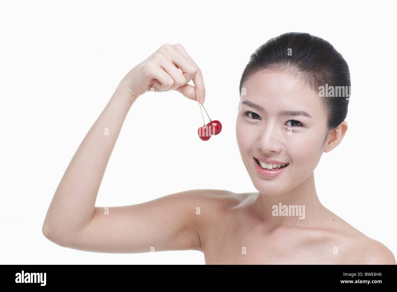 cherry and spotless skin woman Stock Photo Alamy