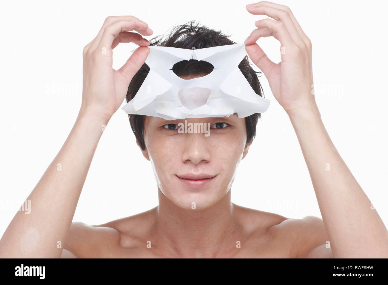 guy is taking a face pack off Stock Photo Alamy