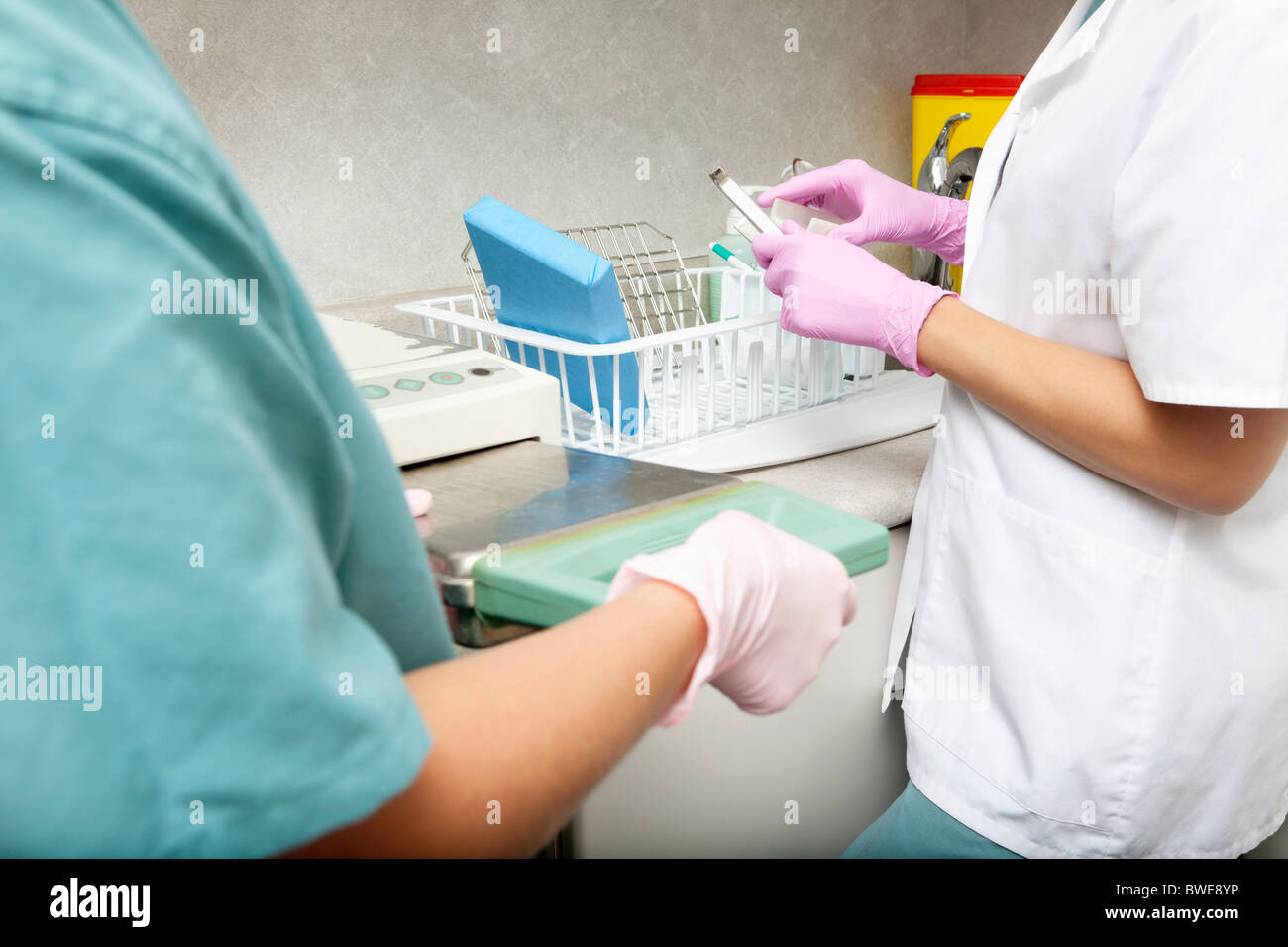 A medical professional sterilizing equipment Stock Photo