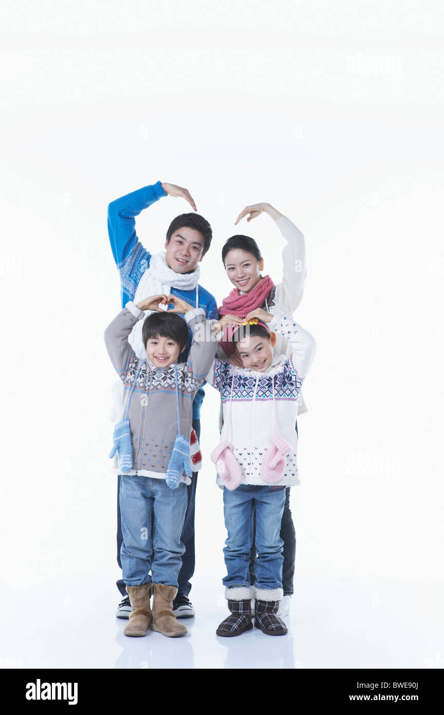 family posing like heart shaped Stock Photo