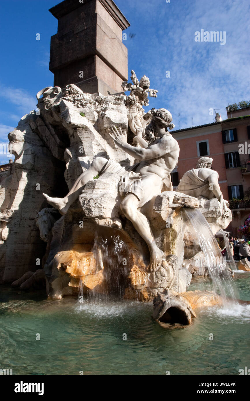 Navona square sculpture Fountain ancient Bernini  Four Rivers in Piazza 'human body' male man men Rome Italy Italian European Ro Stock Photo