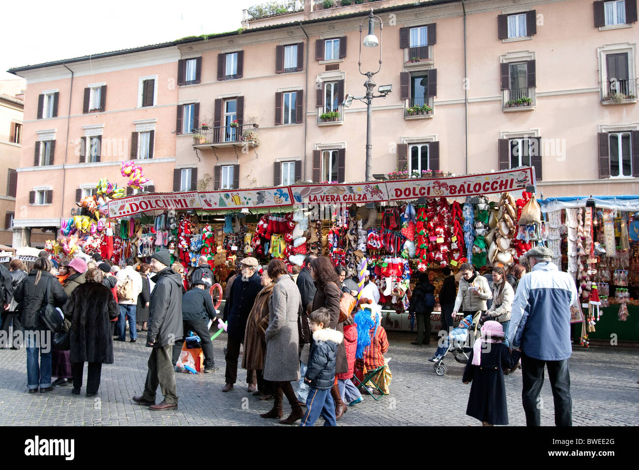 People walking in piazza Navona square Christmas time festivity Rome Italy Epiphany goods Stock Photo
