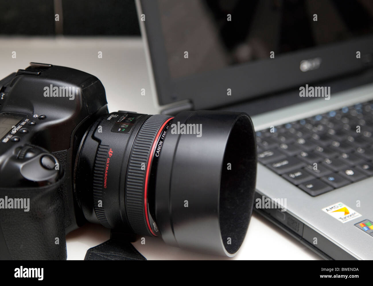 Digital camera and laptop computer, London Stock Photo