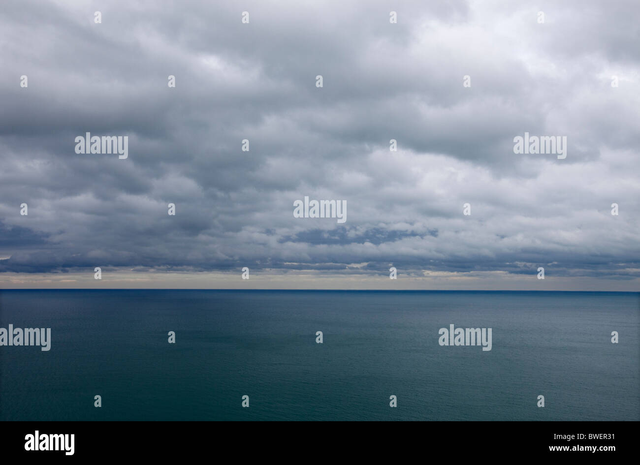 A heavy sky over the sea at Aberystwyth, Wales, UK Stock Photo