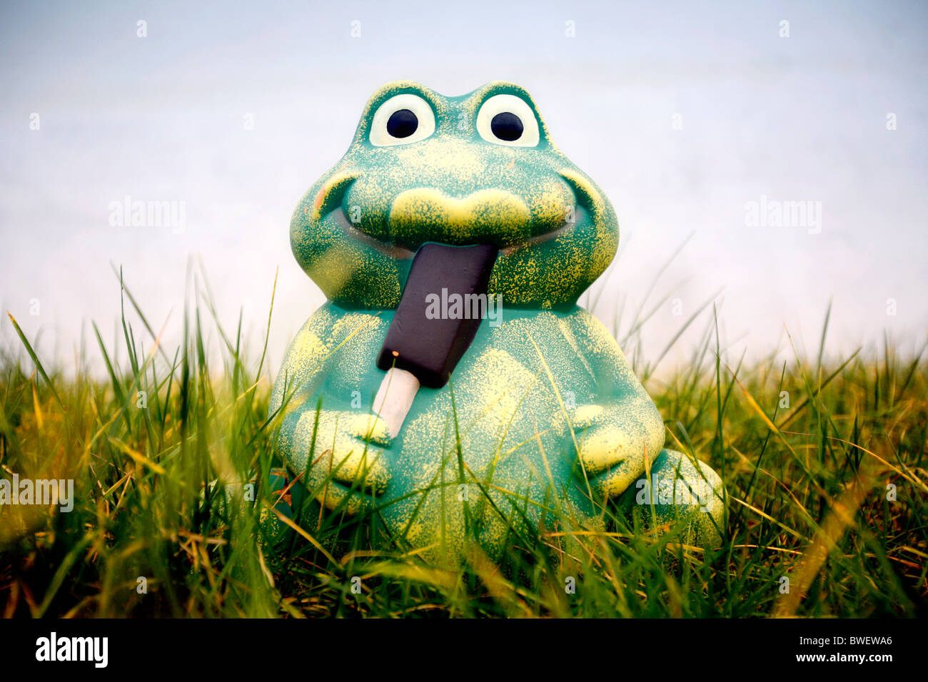 Frog with an ice-cream Stock Photo