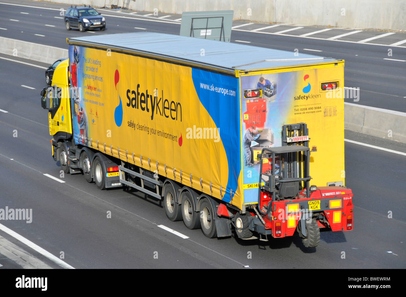 Fork Lift Truck Carried On Back Of Articulated Lorry Stock Photo Alamy