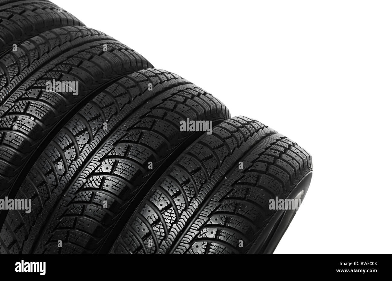 Set of four winter tires isolated on white background Stock Photo Alamy