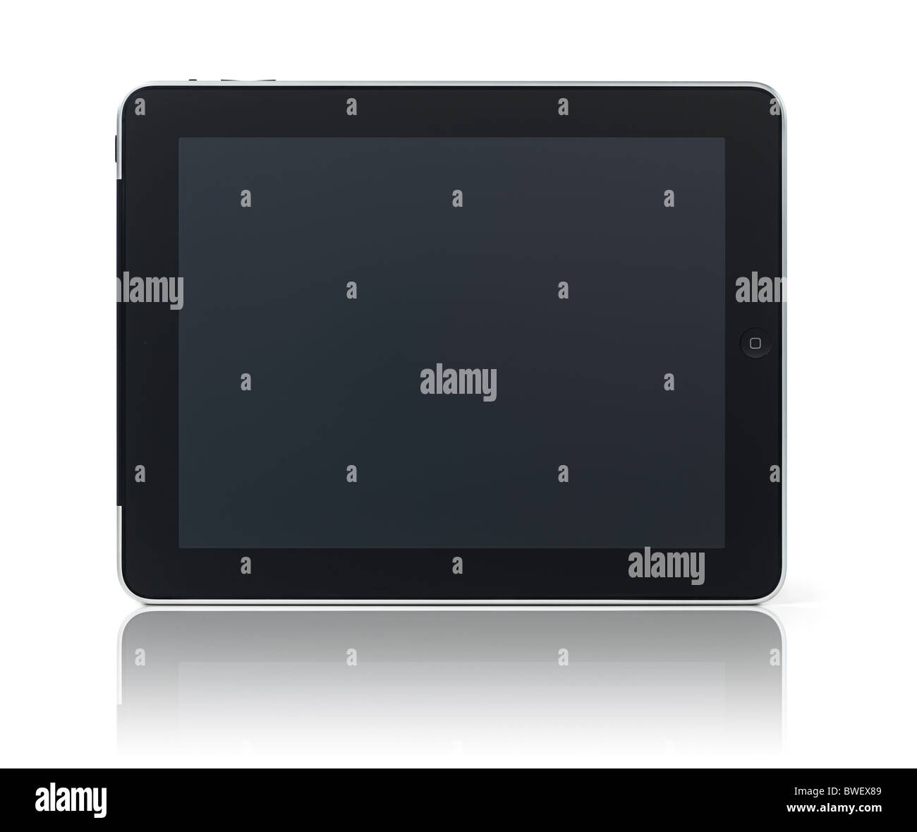 Apple iPad 3G tablet computer with blank screen standing on its side isolated on white background with clipping path Stock Photo
