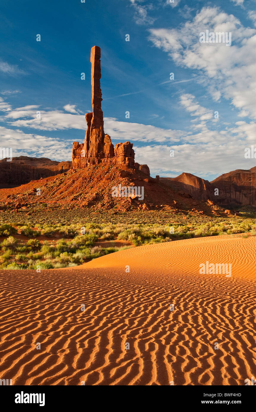Totem Pole with sand dunes in the morning, Monument Valley, Arizona, USA Stock Photo