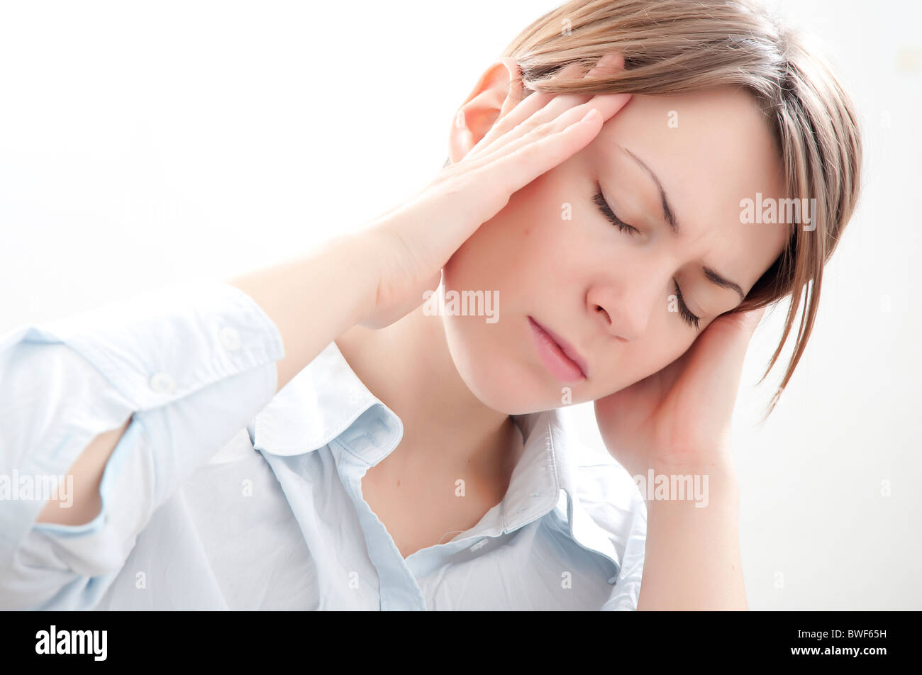 Woman Portrait Hands On Temples High Resolution Stock Photography and ...