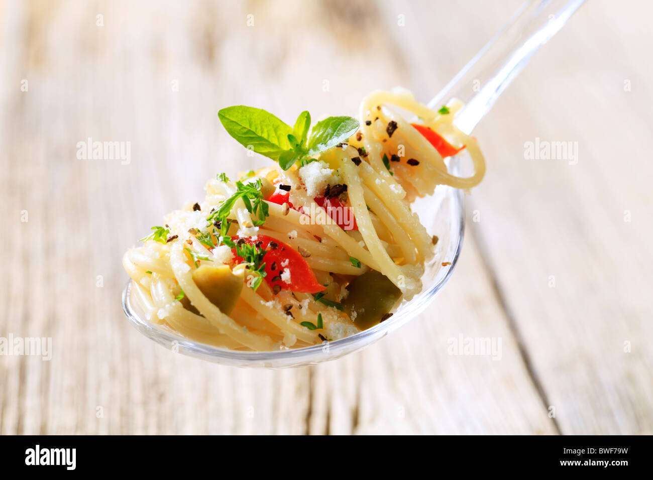 Spaghetti salad on a spoon Stock Photo