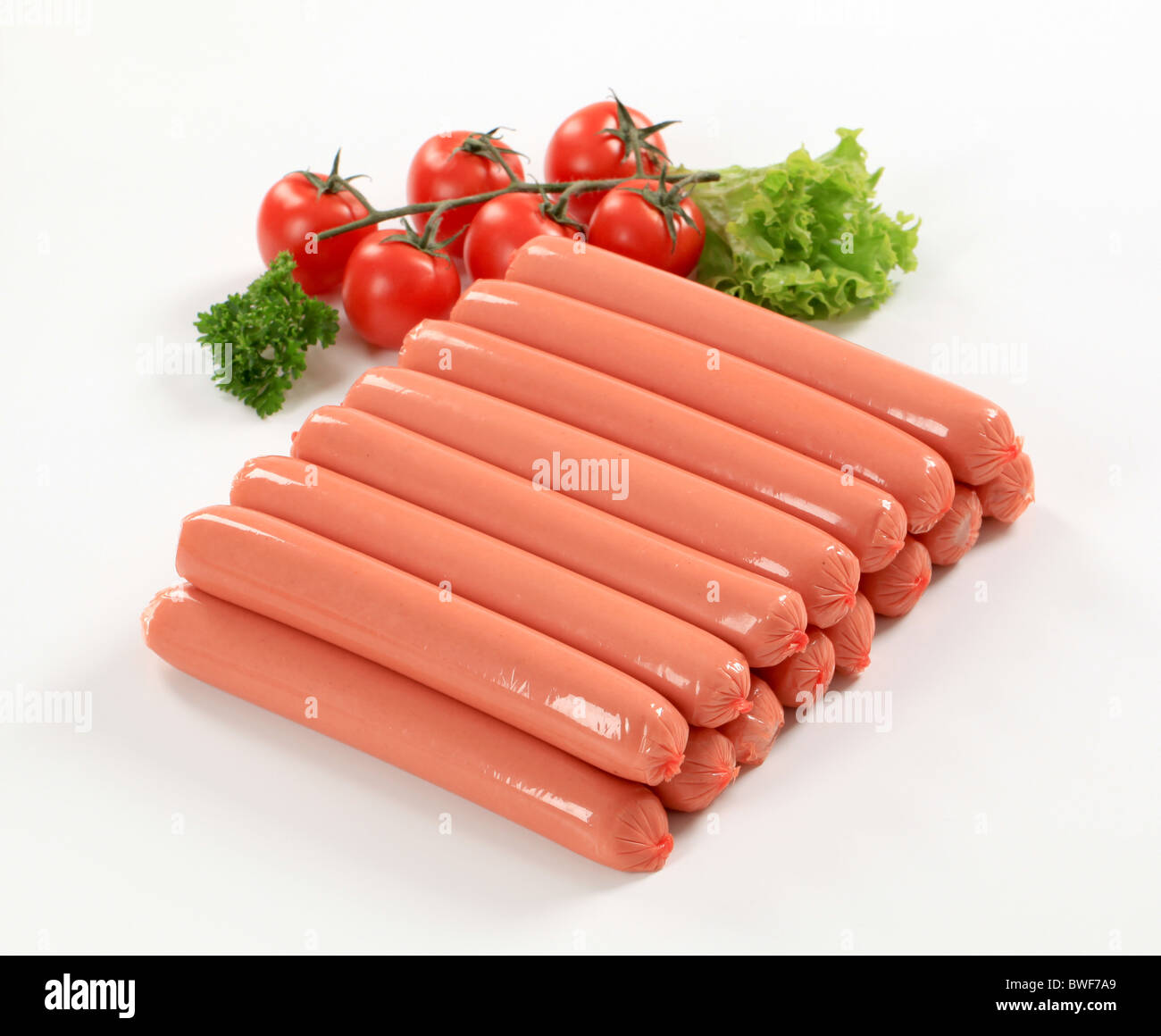 Stack of sausages in artificial casings Stock Photo Alamy