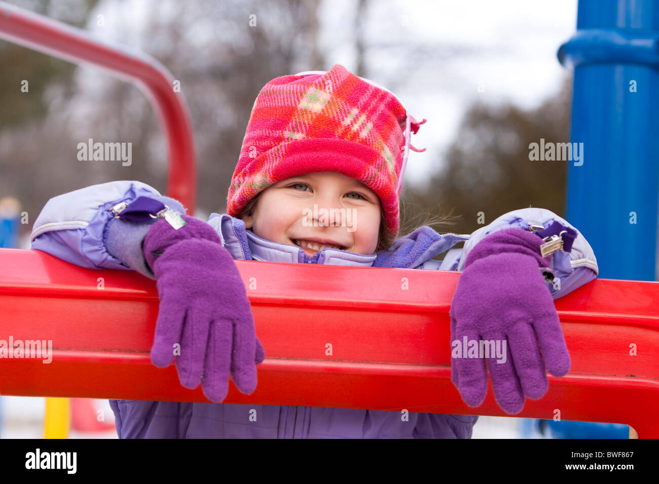 girl on playground smiling Stock Photo - Alamy
