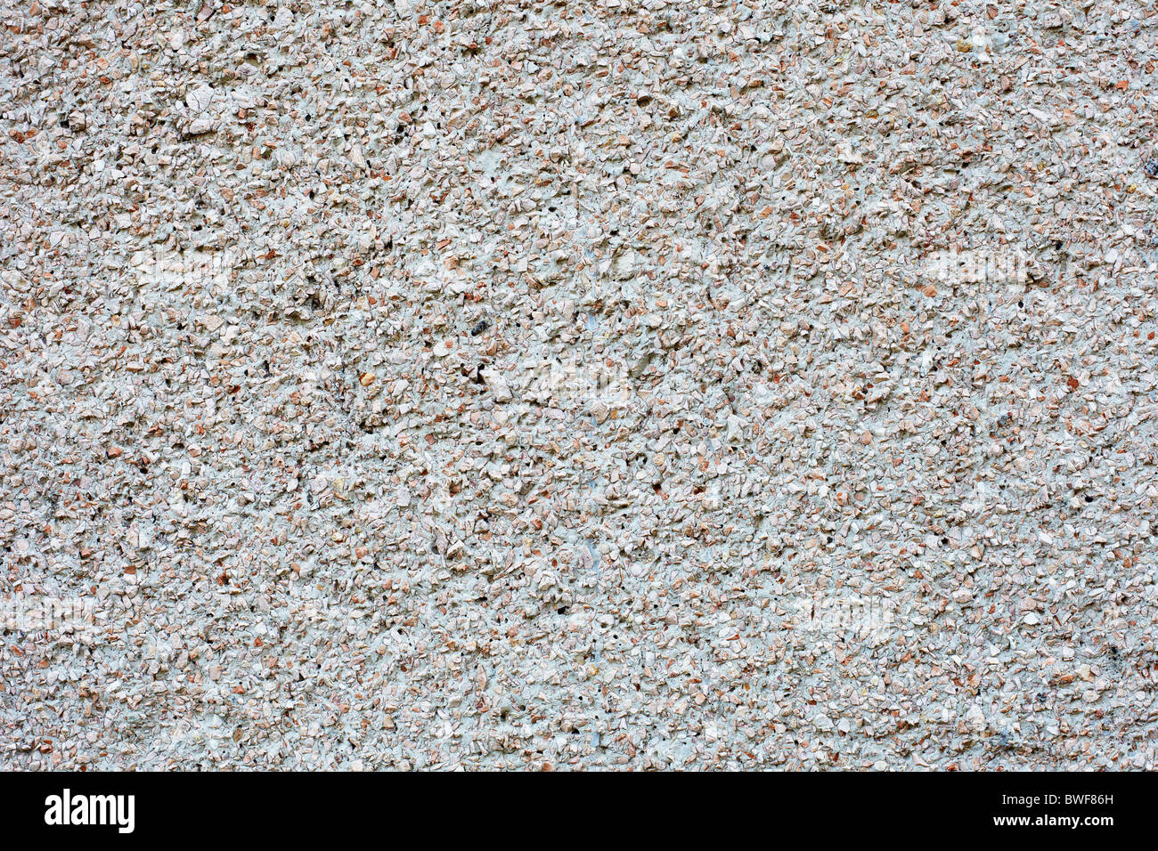 Rough plaster with a marble crumb - architectural texture Stock Photo