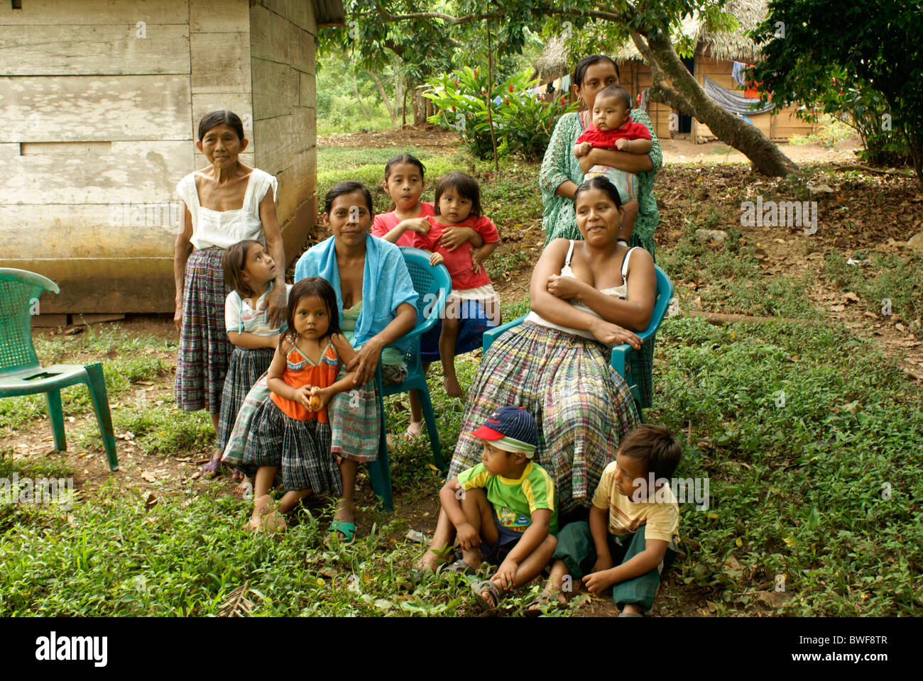 Several generations of Q'eqchi Maya women and children, Candelaria Caves, Alta Verapaz, Guatemala Stock Photo