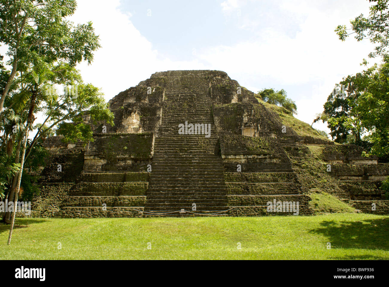 Great Pyramid in the Mundo Perdidio or Lost World complex, Tikal, El Peten, Guatemala. Tikal is a UNESCO World Heritage Site. Stock Photo