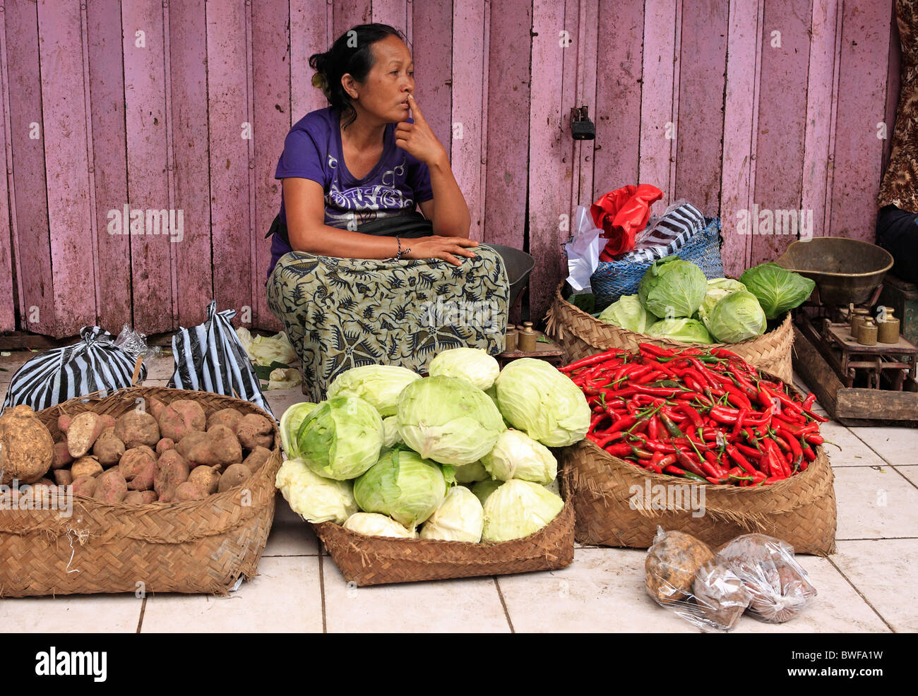 A fruit and vegetable seller at the traditional markets, Ubud, Bali, Indonesia Stock Photo