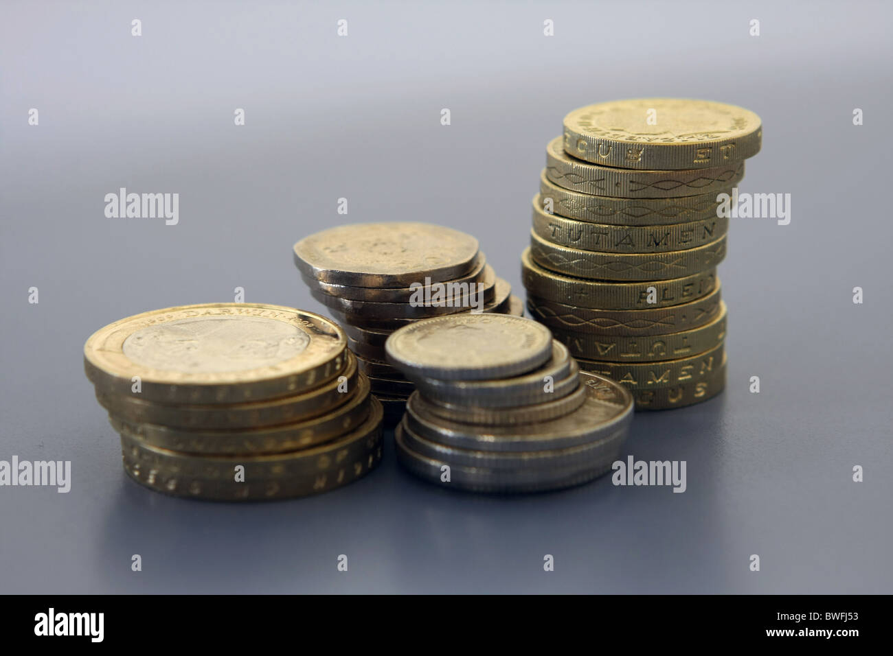 Stacks of £2, £1, 20p with a stack of 5p on 10p coins Stock Photo - Alamy