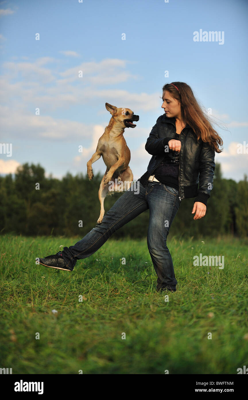 woman and mongrel Stock Photo