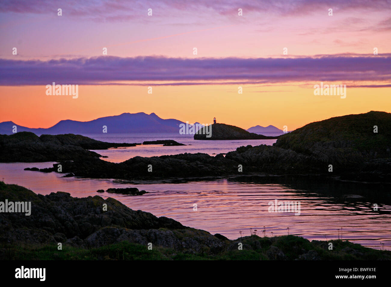 UK Scotland Strathclyde Argyll The Cairns of Coll at dawn looking over to the island of Rum Stock Photo