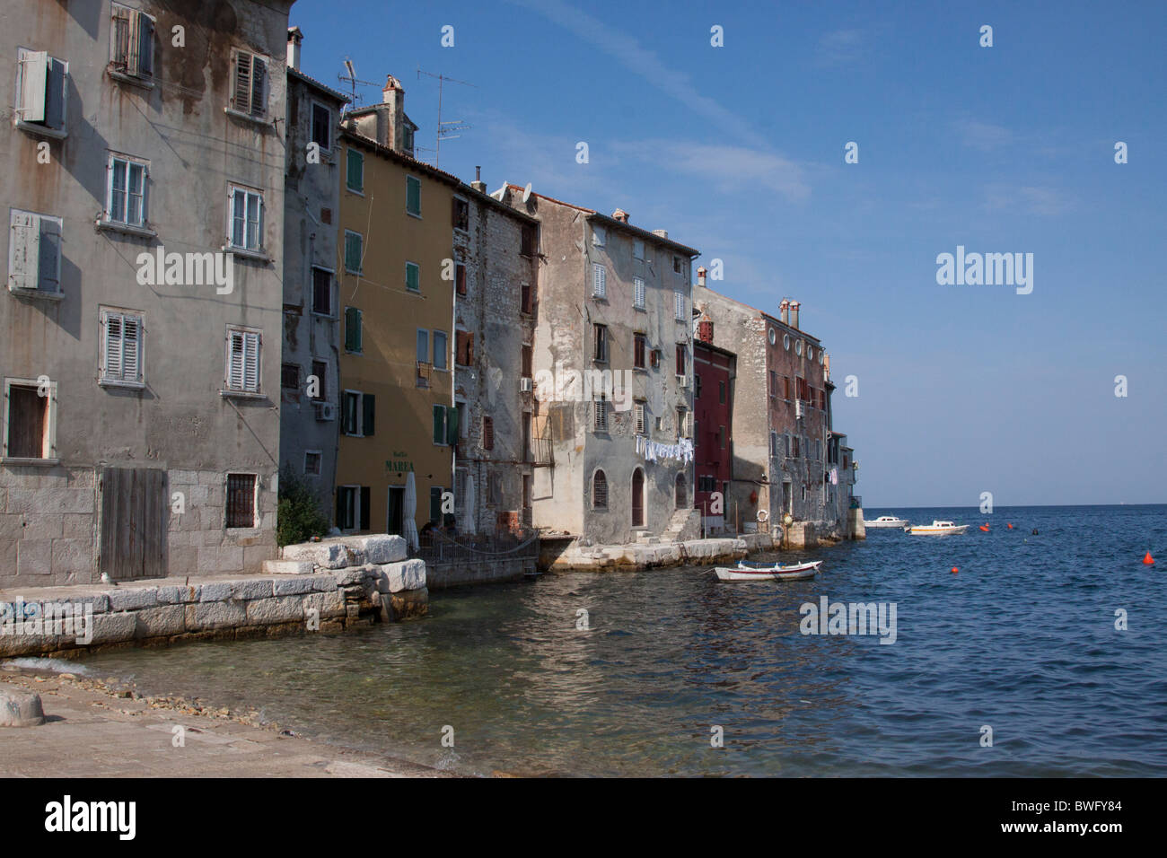 Rovinj old buildings by the sea Stock Photo