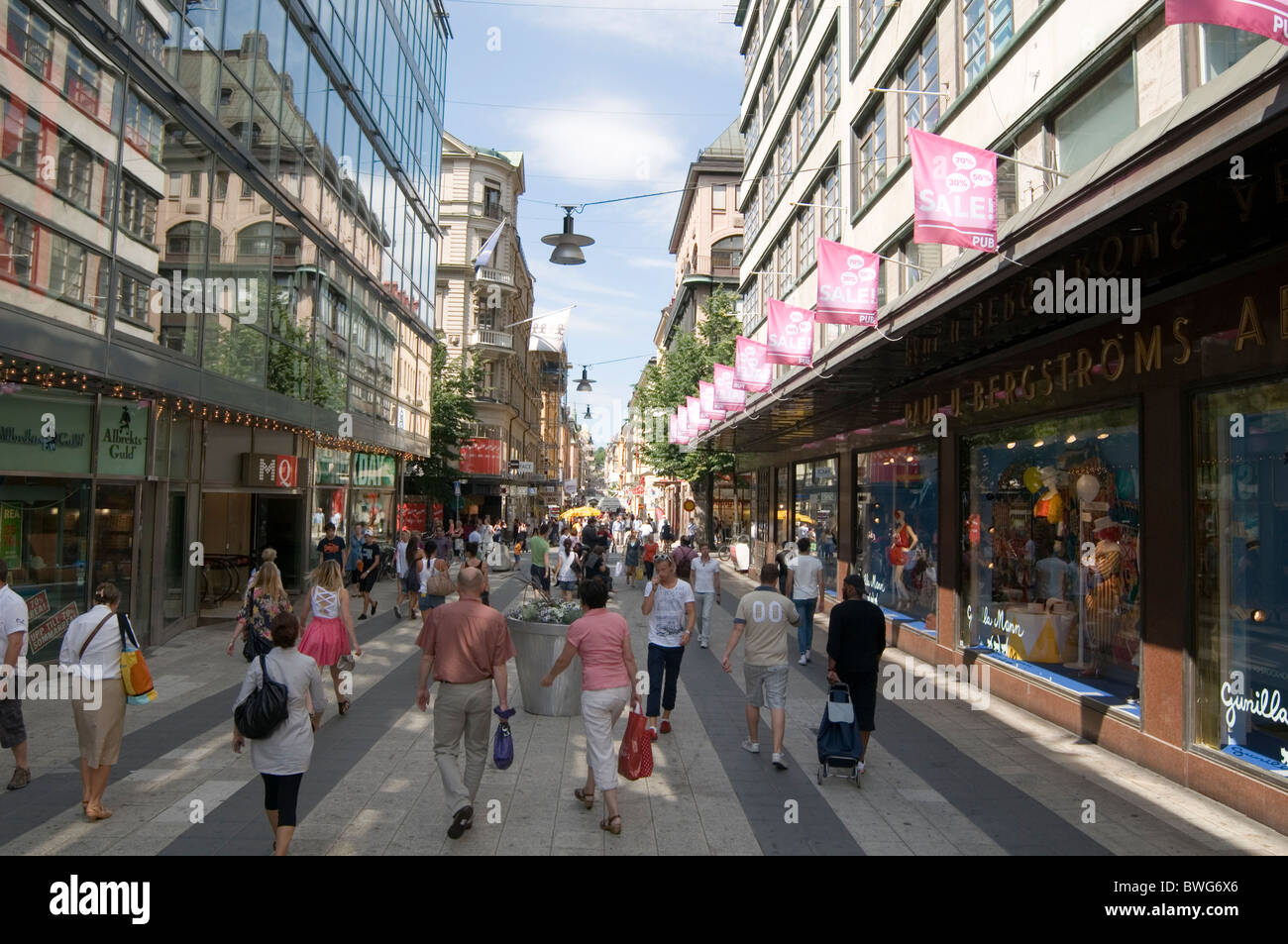 Drottninggatan Stockholm city center shops shopping shoppers sweden swedish sverge retail retailers shop summer street street pedestrian Stock Photo