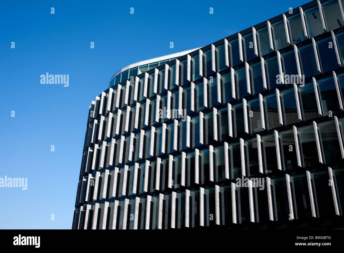 Architecture of a modern office building in Srodmiescie district, Warsaw, Poland. Stock Photo