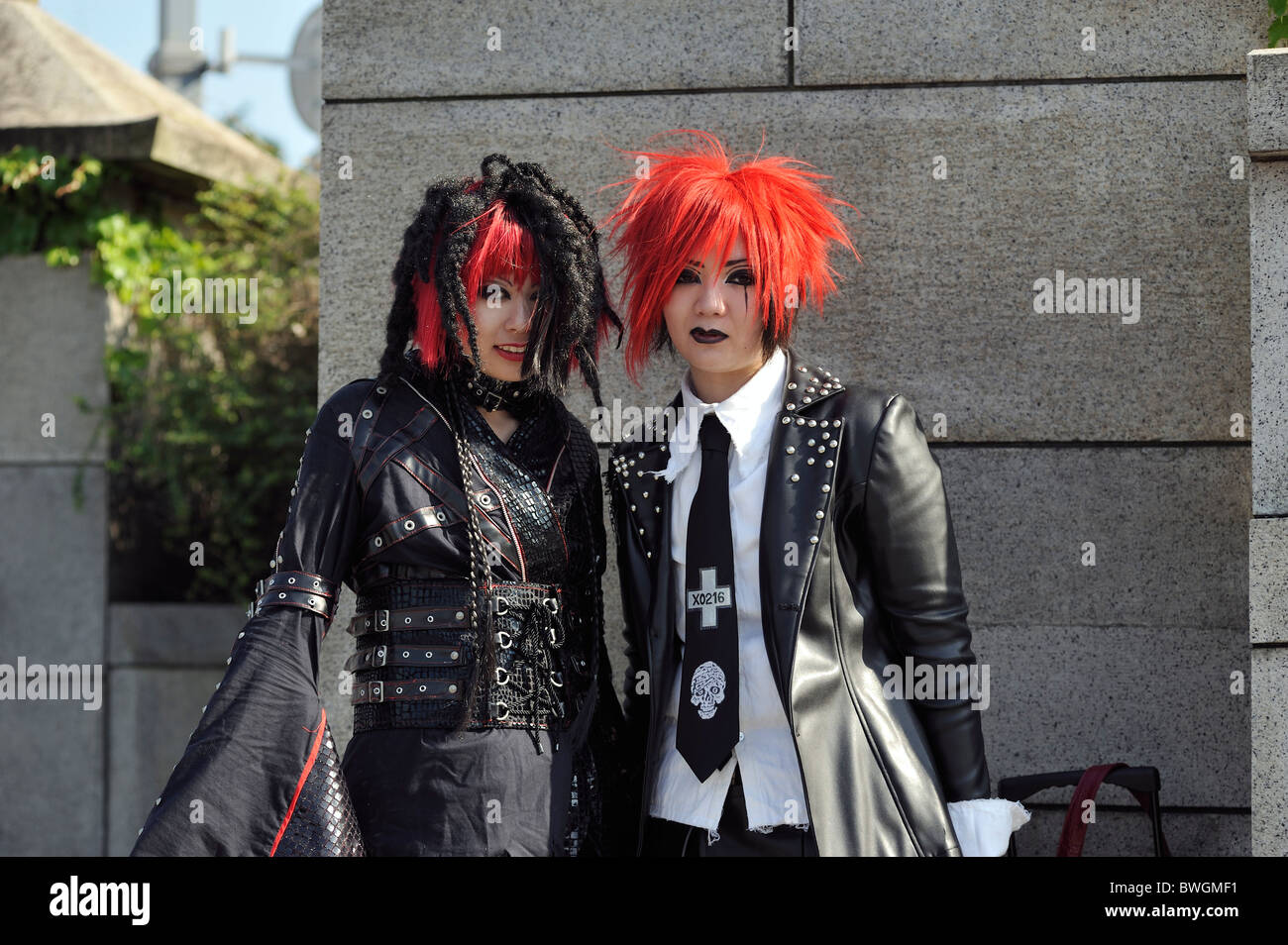 Two female Japanese cosplayers on Jingu bridge, Harajuku, Tokyo, Japan Stock Photo