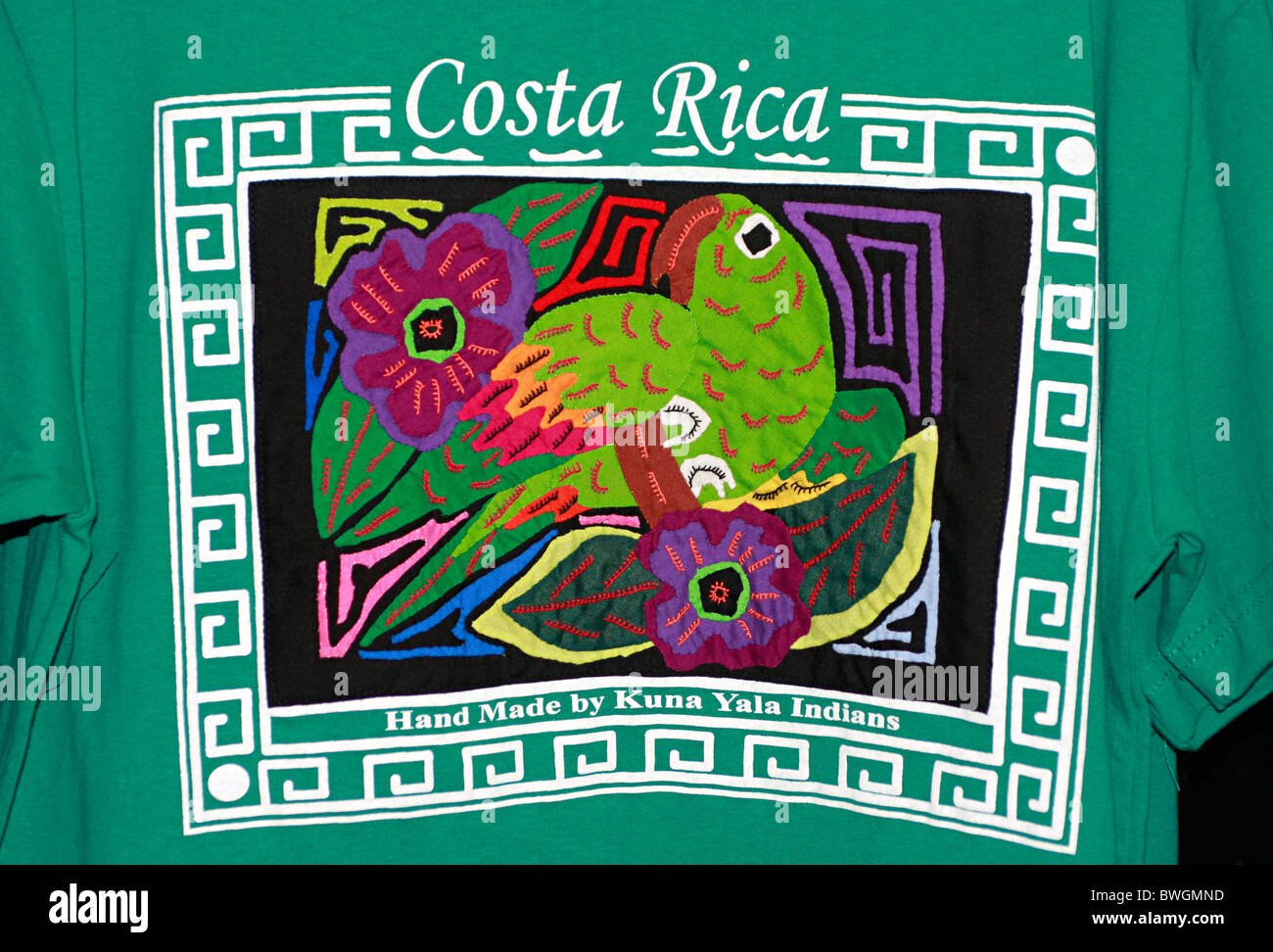 brightly colored Costa Rica Tee shirt with parrot and flowers Stock Photo