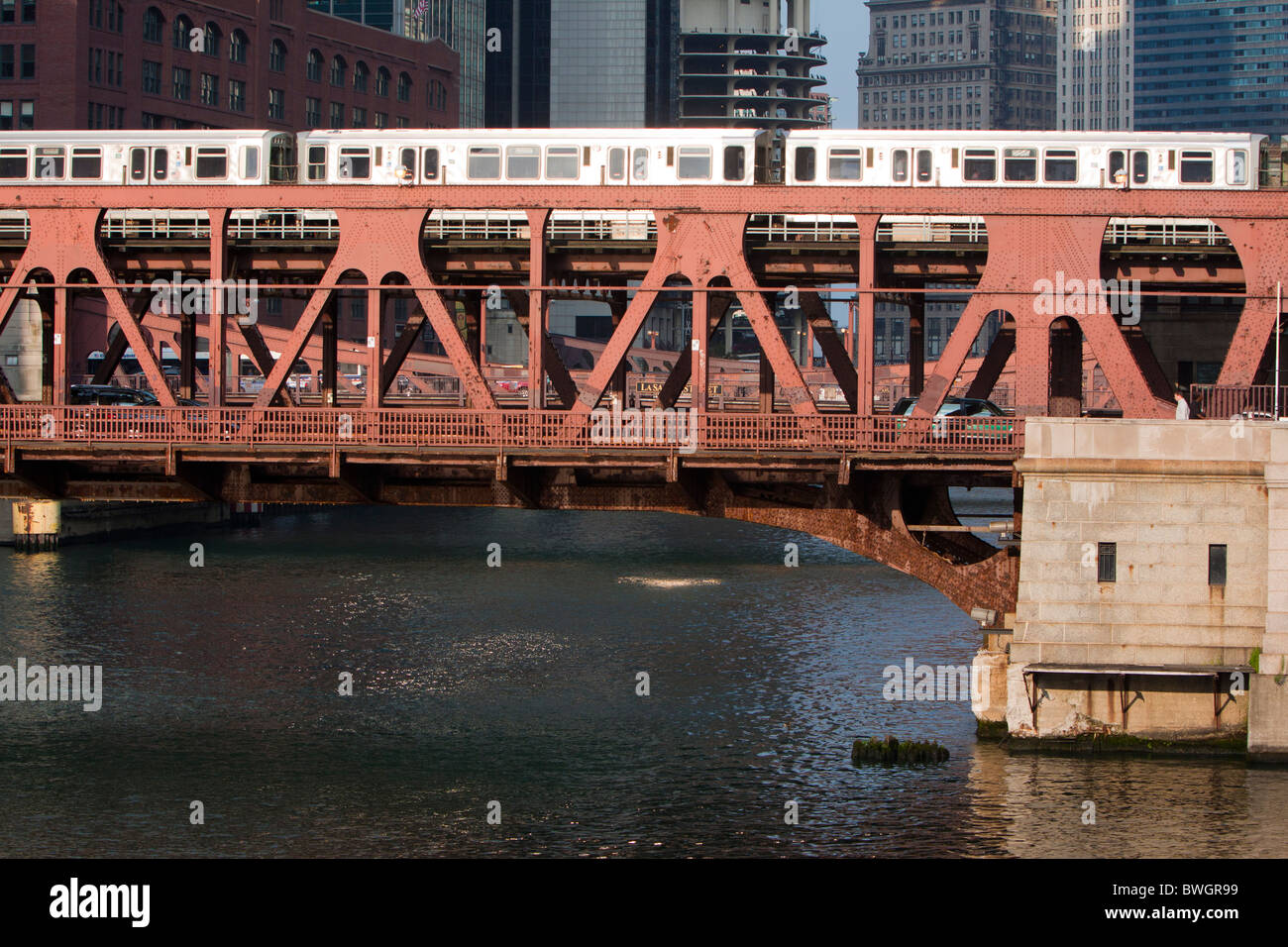 The famous Chicago L train rattles over the Well Street bridge above the Chicago River. Stock Photo