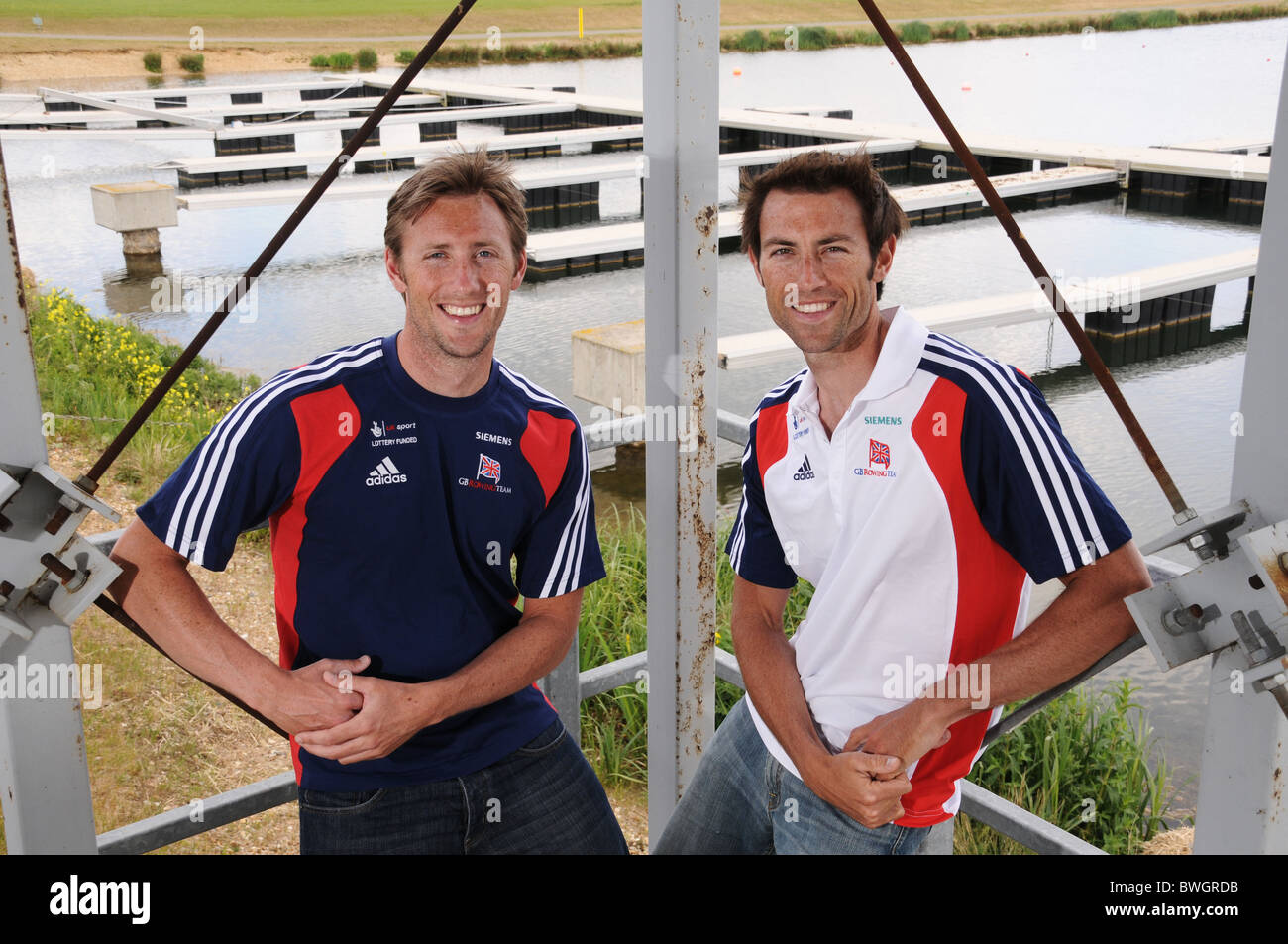 Rowing brothers Ross Hunter (left) and Mark Hunter MBE prepare for 2012 Olympics at start on Dorney Lake GB rowing venue in 2012 Stock Photo