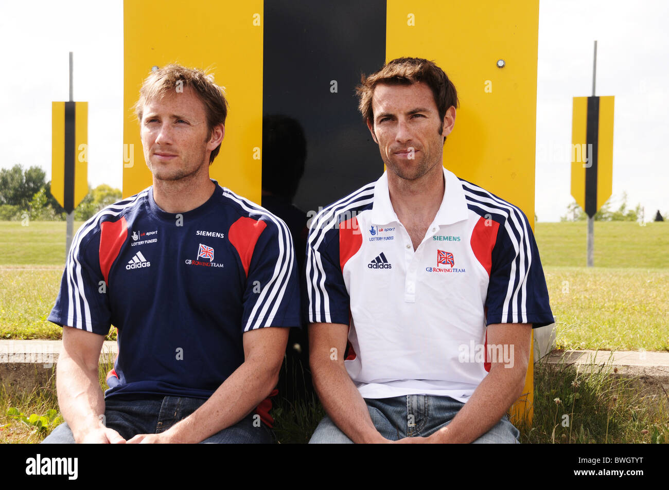 Rowing brothers Ross Hunter (left) and Mark Hunter MBE prepare for 2012 Olympics at start on Dorney Lake GB rowing venue in 2012 Stock Photo