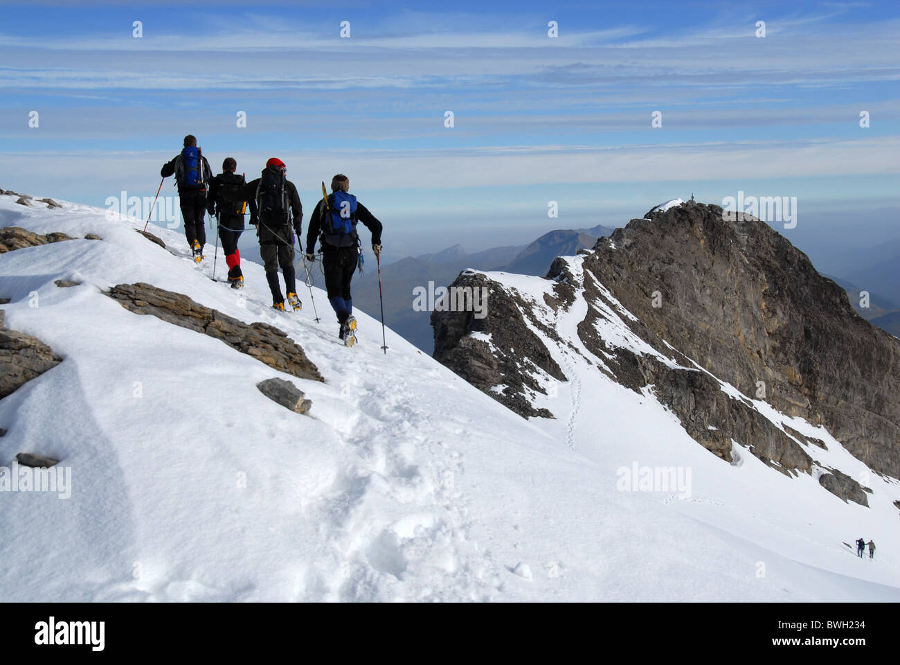 Mountain climbers, summit ridge of Wildhorn, Bernese alps, Switzerland Stock Photo