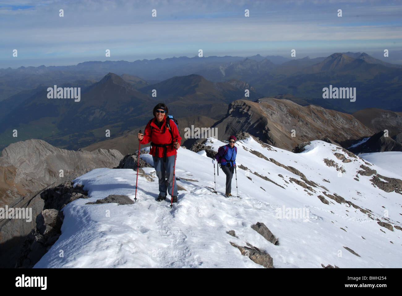 Women mountain climbers toward summit of Wildhorn, Bernese Alps, Switzerland Stock Photo